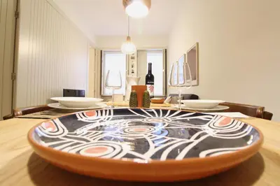 a living room with a couch and a table at Host Wise - UNIK Porto Apartment in Porto