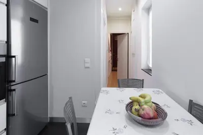 a bowl of fruit on a table in a kitchen at Porto Belomonte Flats - T2 in Porto