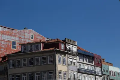 a group of buildings with the sky in the background at RIBEIRA CHARMING APARTMENTS in Porto