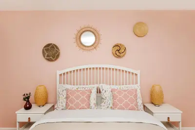 a bedroom with pink walls and a bed with pink pillows at Sancha Apartment - in the Centre near the Aliados in Porto