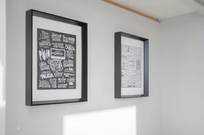two framed pictures on a wall in a room at Liiiving in Porto I Bright Light Studio in Porto