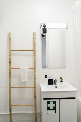 a bathroom with a sink and a mirror at River Flat I - Heart of Porto in Porto