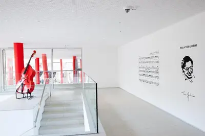 a bakery with many different types of bread and pastries at Hotel da Música in Porto