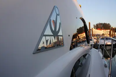 a white boat with a sign on the side of it at Cozy room with lake view in Porto 12 m² and terrace in Porto
