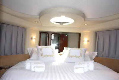 a bedroom with two white pillows on a bed at Cozy room with lake view in Porto 12 m² and terrace in Porto