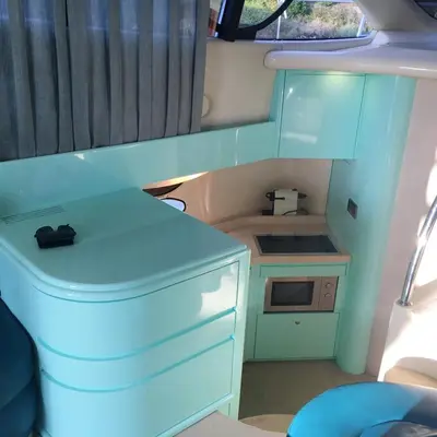 an inside view of a kitchen in a rv at Cozy room with lake view in Porto 12 m² and terrace in Porto
