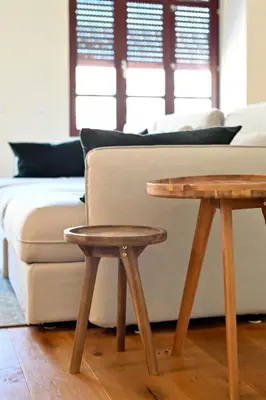 two wooden tables in a living room with a couch at Oporto Chic&Cozy - Batalha II in Porto