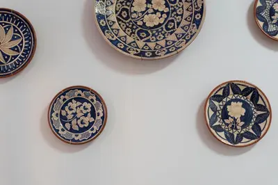 a group of blue and white plates on a white background at LovelyStay - Heritage Collection House with 4Bedrooms in Porto