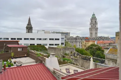 a view of a city with two towers and buildings at Downtown Porto Spot - 2 bedroom Apartment in Porto
