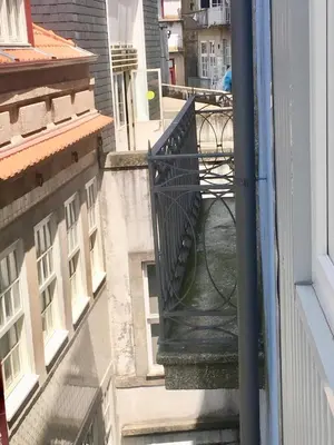 an overhead view of a balcony of a building at Porta de São Bento in Porto