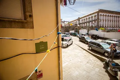 a street with cars parked on the side of a building at Porto & Douro Best Views by PCH in Porto