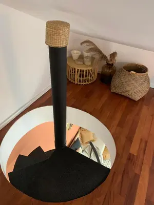 a black and white lamp on a wooden floor at Oak Valley Flats Porto Santa Catarina in Porto