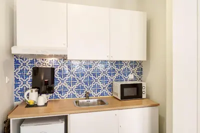 a blue and white pattern on a wall at Porto Tile House in Porto