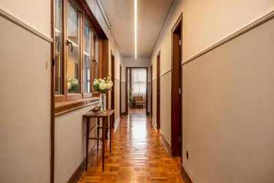 a corridor of a hallway with a hallway at YOUROPO - Santa Catarina in Porto