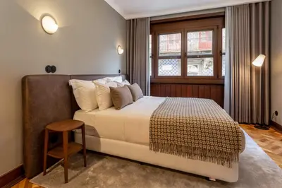 a bedroom with a large bed and a window at YOUROPO - Santa Catarina in Porto