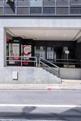 a building with stairs in front of a building at HM - Nearby Bolhão Studio in Porto