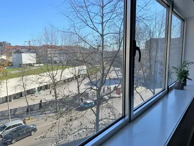 a window with a view of a parking lot at Ninon- Premium Trindade by Porto City Hosts in Porto