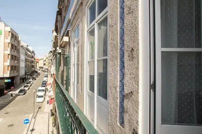 an apartment balcony with a view of a city street at Santa Catarina Views by Porto City Hosts in Porto