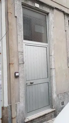 a door on the side of a building at Oporto Beauty Flat in Porto