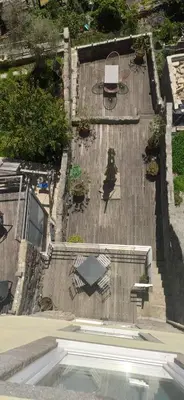 an aerial view of a patio with a table and chairs at Stay In Apartments - D. Hugo 23 in Porto