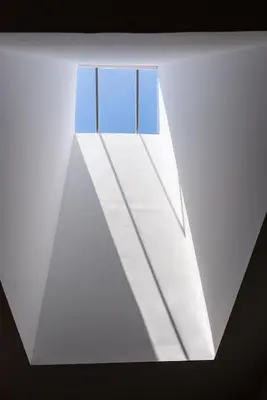 a window on the side of a white building at ZD Moreira Flats C By PortoProperties4You in Porto