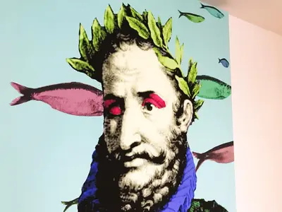 a painting of a man with leaves on his head at Camões Lookout in Porto
