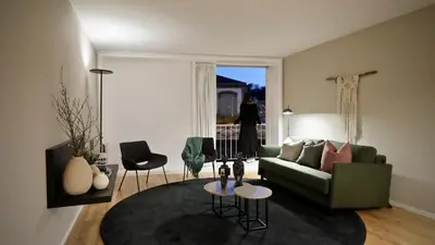 a living room with a couch and a table at Oporto Serviced Apartments - Miragaia in Porto