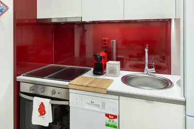 a kitchen with a sink and a counter top at D&S - Torne Apartments in Vila Nova de Gaia