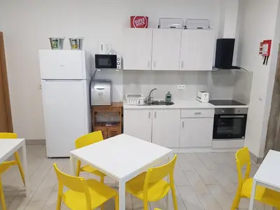 a group of bunk beds in a room at By Doors Hostel in Porto