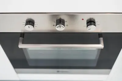 a stove with three lights on top of it at Cedofeita Lux Design in Porto