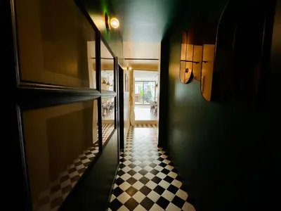 an open door into a bathroom with a sink at Boreal Porto Gaia - Patio & Pool in Vila Nova de Gaia