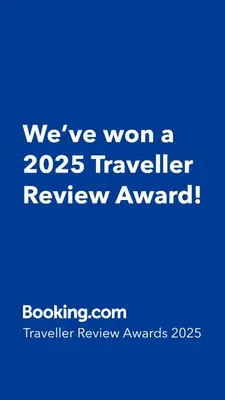 a blue sign that says weve won a traveler review award at InPorto in Porto