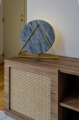 a hat on top of a wooden table at BOUTIQUE Rentals-Kihara’s Ribeira Apt with great views in Porto