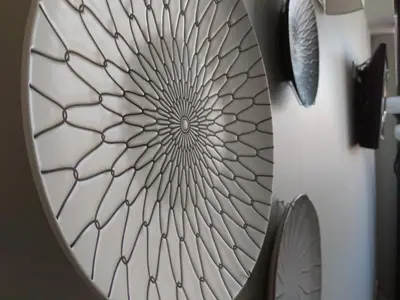 a mandala pattern on a door of a washing machine at Chez Moi Bolhão in Porto
