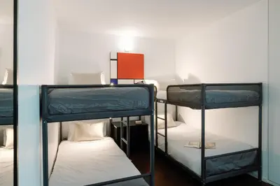 a group of bunk beds in a room at Fine Arts Studios by Olala Homes in Porto