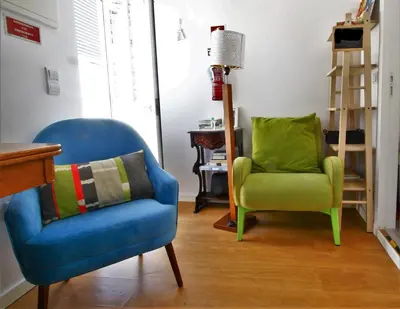 a kitchen counter with a sink and a microwave at St. Johns Alley of Poetry and Imaginary Cats in Porto