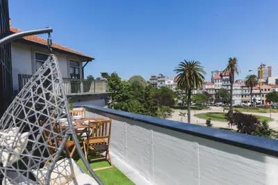 a view from the balcony of a house with a table at Aposentus - Skyline Porto in Porto