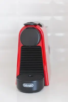 a red and black cell phone sitting on a table at Aposentus - Skyline Porto in Porto