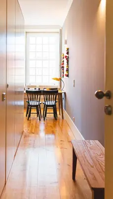 a dining room with a table and two chairs at APOSENTUS - Your Home at Oliveiras in Porto
