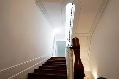a stairway with a bottle on the side of it at Santa Catarina Guest House (Porto city center) in Porto