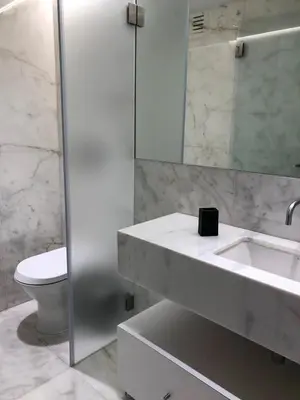 a bathroom with a sink and a toilet at Oporto Chic&Cozy - Ateneu in Porto