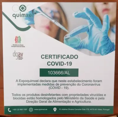 a woman in a laboratory with a test tube and gloves at lita’s House Oporto Bainharia in Porto