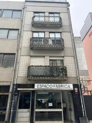 a building with a sign that reads esparo faza at OPORTO APARTMENT LUXURY in Porto