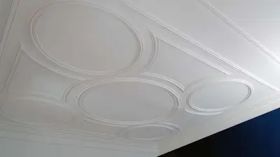 a white ceiling with a circular design on it at So Cool Hostel Porto in Porto