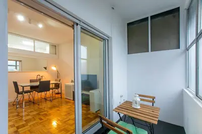 a room with a table and a dining room at Casa da Alegria- Downtown by Oporto Soul in Porto