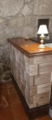 a table with a lamp on top of boxes at Cosy apartment in Porto city centre – 50 sqm with parking in Porto