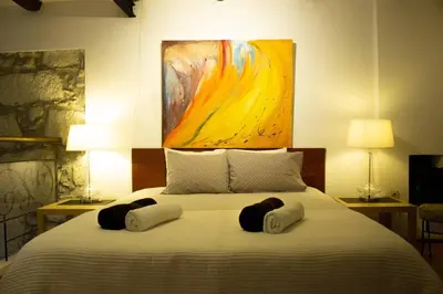 a bedroom with a bed with two towels on it at Cosy apartment in Porto city centre – 50 sqm with parking in Porto