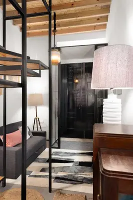 a bedroom with a bunk bed and a lamp at Porto National Theatre Trendy Houses in Porto