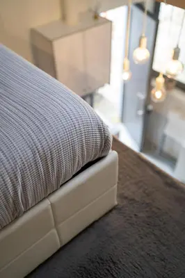 a close up of a pillow on a table at CASA DOURO Porto City in Porto