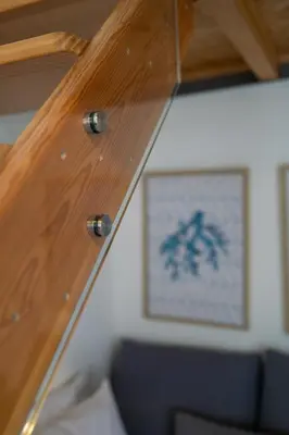 a wooden staircase in a room with a picture on the wall at CASA DOURO Porto City in Porto